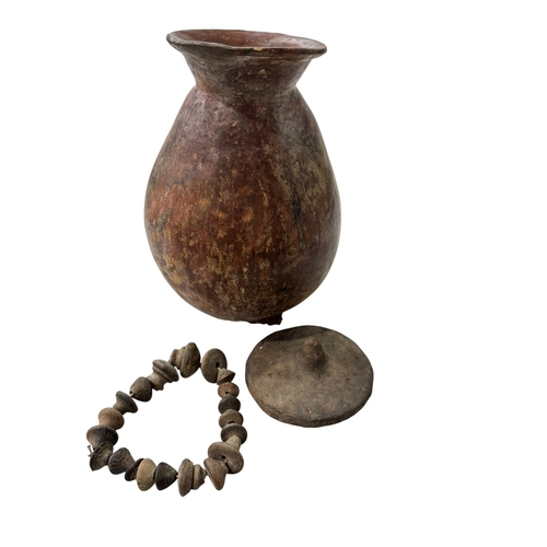 219 - Columbian red clay vessel circa 800AD and a ring of 20 Torteros.