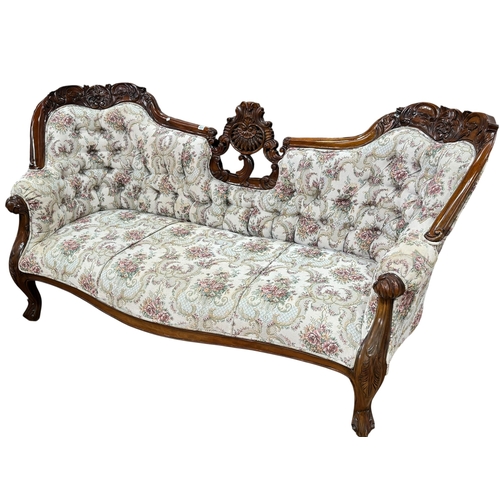 311 - Pair Victorian style three seater settees in buttoned floral tapestry fabric.
