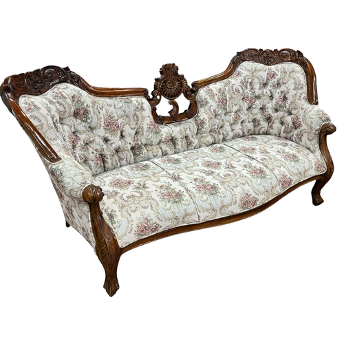 311 - Pair Victorian style three seater settees in buttoned floral tapestry fabric.