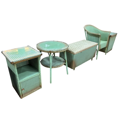 322 - Five piece suite of green Lloyd Loom bedroom furniture comprising circular table, chair, blanket box... 