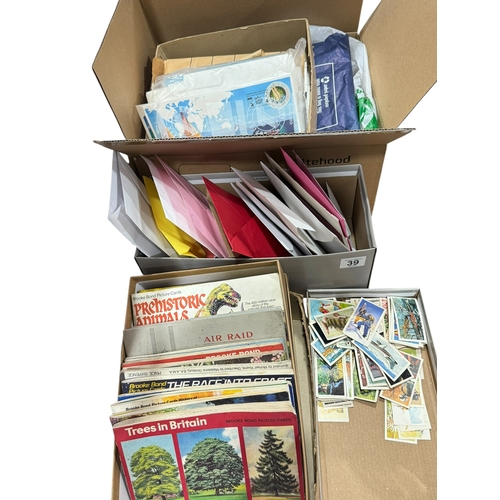 39 - Box of stamps, first day covers and world stamps, and collection of cigarette cards.