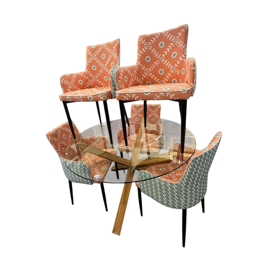 279 - Contemporary circular glass topped X-framed tables and five chairs.