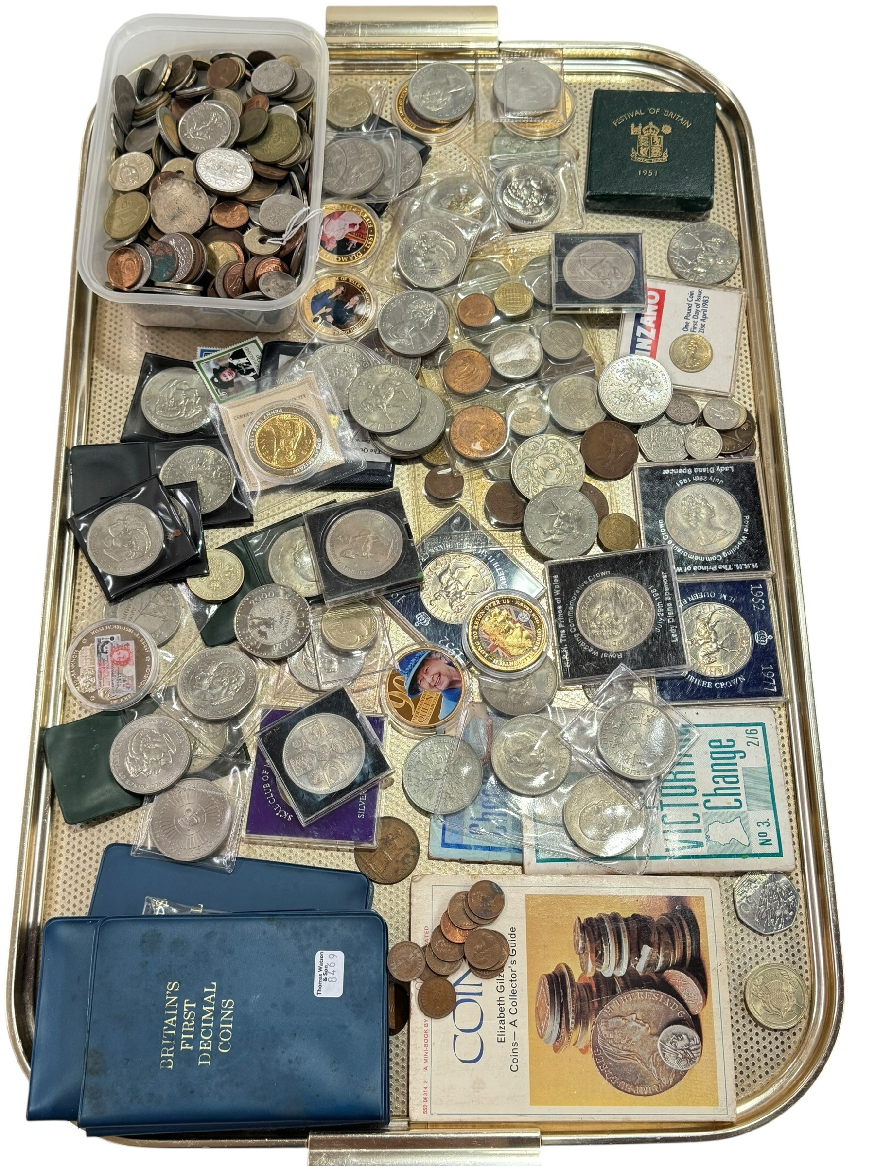 Collection of coins and tokens.