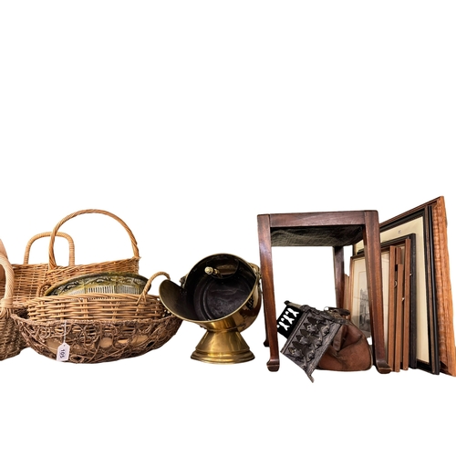 105 - Brass coal scuttle, wicker baskets, pierced cast fender, table lamps, mahogany stool, pictures, rug,... 