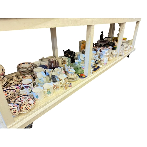 108 - Full shelf of china including Masons Mandalay, teawares, model vehicles, etc.