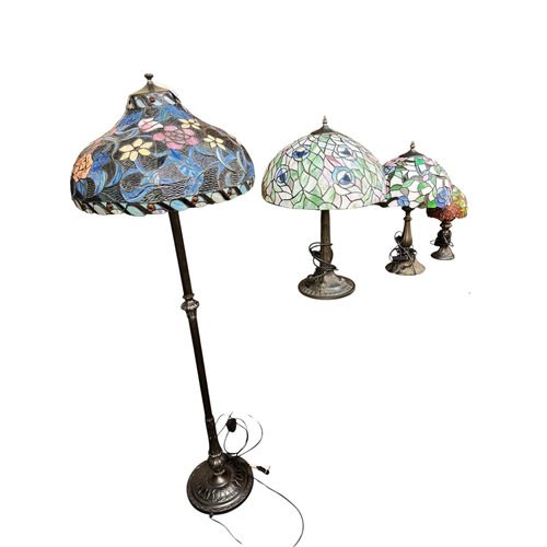 109 - Tiffany style standard lamp and three table lamps.