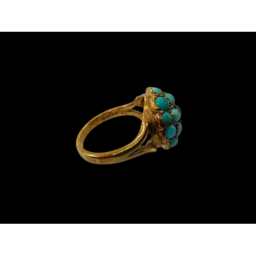 146 - Turquoise cluster 9 carat gold ring, size N/O.