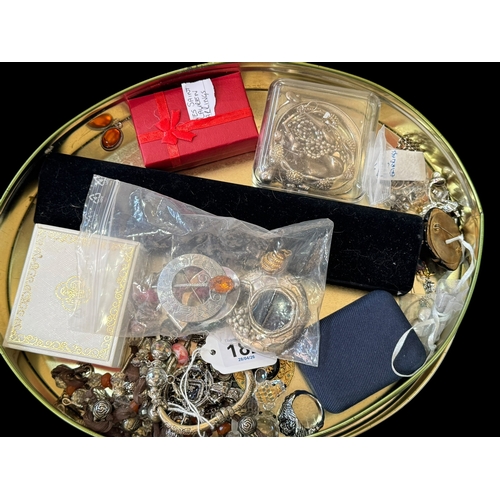 182 - Tin of jewellery including silver.