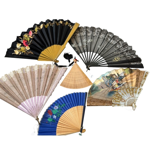209 - Collection of six ornate fans.