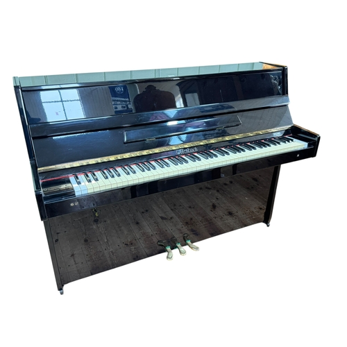 326 - Black lacquered Offenbach upright overstrung piano serial number 132909.