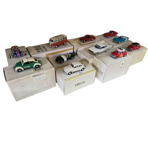 66 - Collection of twelve Franklin Mint models of 1960's motor vehicles including two Morris Mini Coopers... 