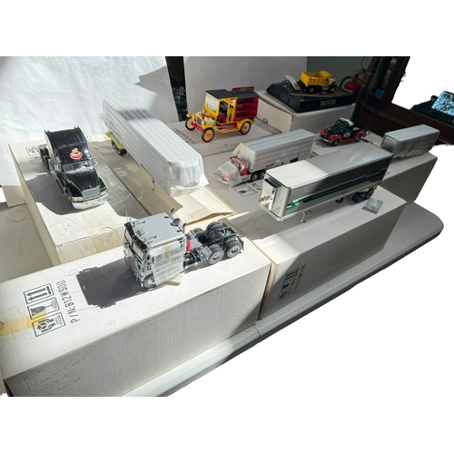 69 - Collection of seven Franklin Mint commercial vehicles including Mach Elite tractor and trailer, 1979... 