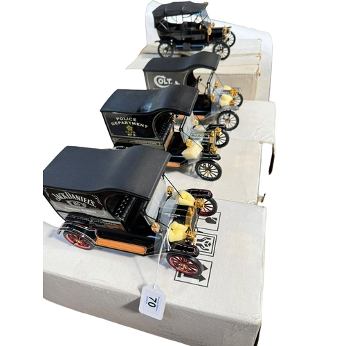 70 - Five Franklin Mint model T Fords including Colt and Jack Daniels delivery trucks, Police Department ... 