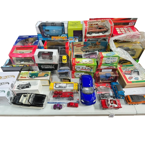 72 - Collection of mostly boxed model vehicles, trailers, etc.