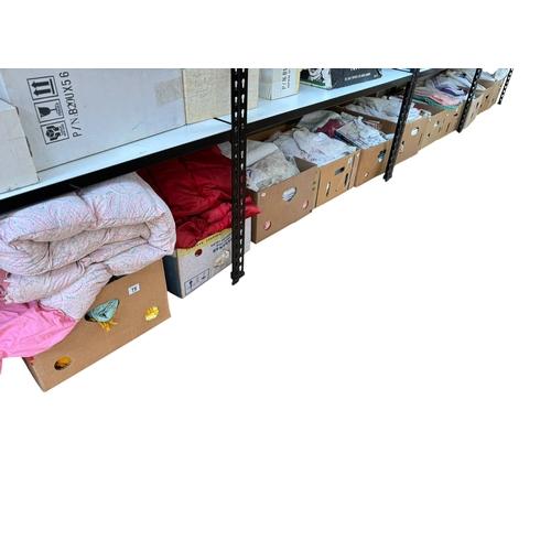 75 - Eleven boxes of assorted lace and linen eiderdowns, bed covers, etc.