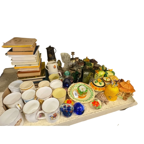 85 - Collection of preserve pots, assorted glass paperweights, commemorative cups, miners lamp, pair of b... 