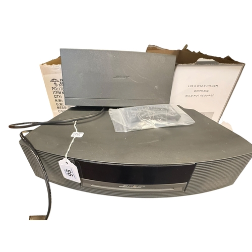 86 - Bose Wave music system and collection of CD's.