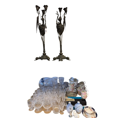 98 - Pair of cast bronze candelabra depicting birds nests with chicks on circular bases raised on snail s... 