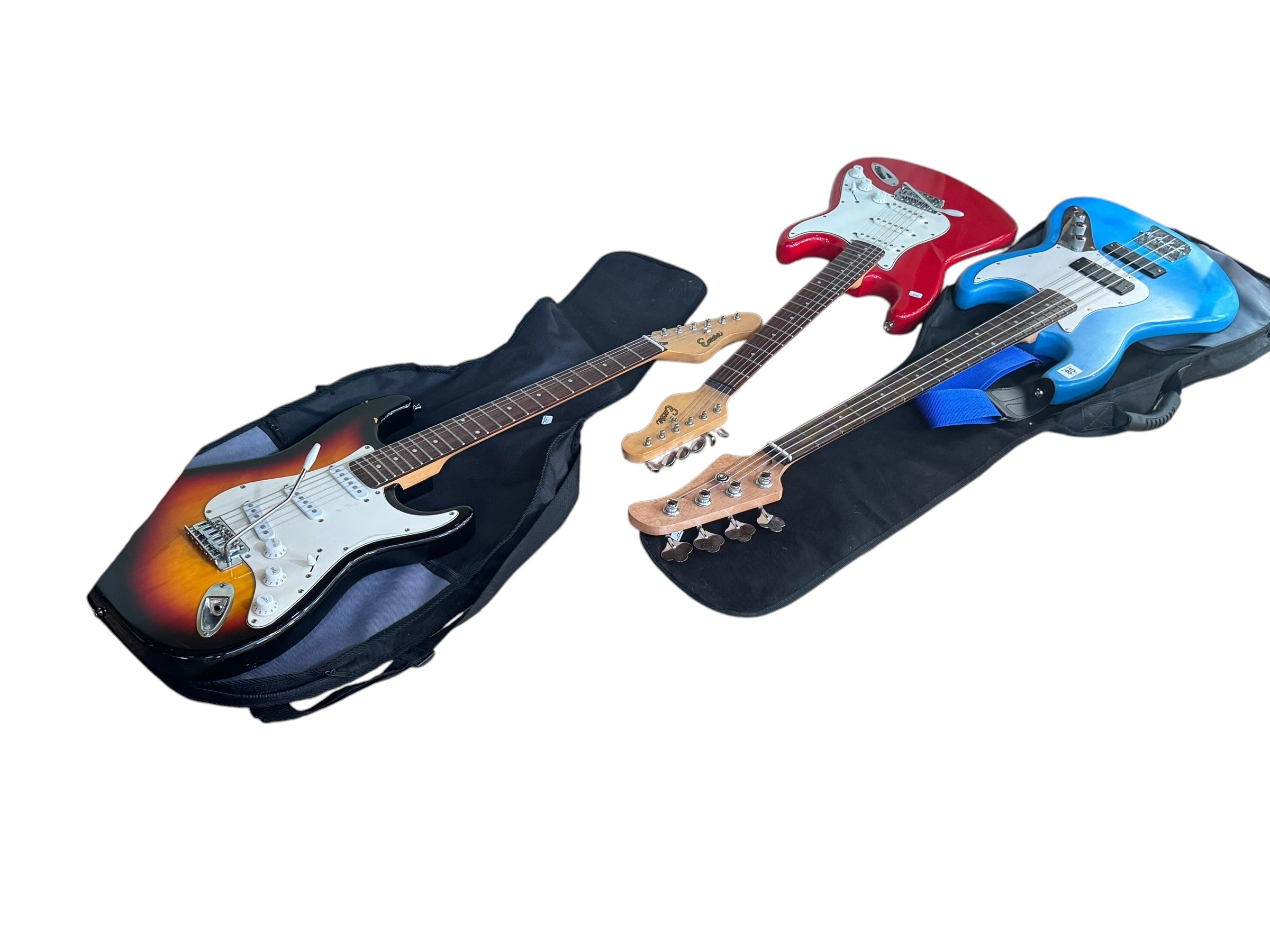 Three electric guitars (two with bags).