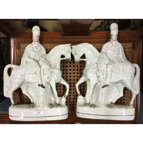 298 - Two large Staffordshire flat back figures.