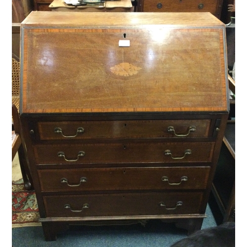 300 - A mahogany inlaid bureau.