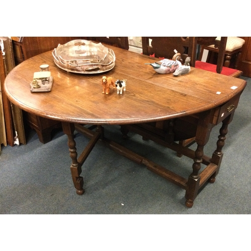 63 - A good Georgian style table with turned supports.