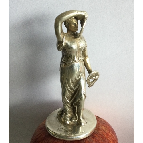 1 - A heavy Victorian silver car mascot in the form of a lady. Approx. 92 grams. Est. £80 - £120.