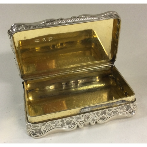 118 - A heavy Victorian silver snuff box with cast rim. London 1868. By FM. Approx. 120 grams. Est. £350 -... 