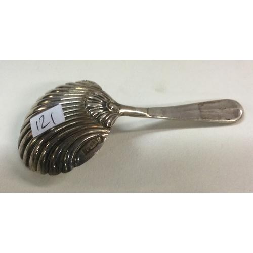 121 - A George III silver caddy spoon. London 1807. By William Burch. Approx. 14 grams. Est. £50 - £80.