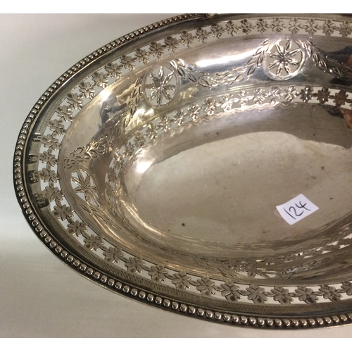 124 - A good George III pierced silver basket engraved with swags. London 1783. By William Laver. Approx. ... 