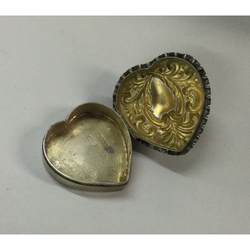 16 - A Victorian silver heart shaped box. Approx. 9 grams. Est. £15 - £20.