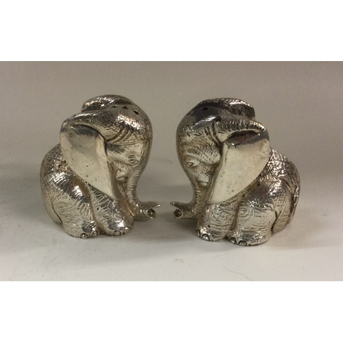 178 - An unusual cast pair of peppers in the form of elephants. London 2003. Approx. 180 grams. Est. £350 ... 