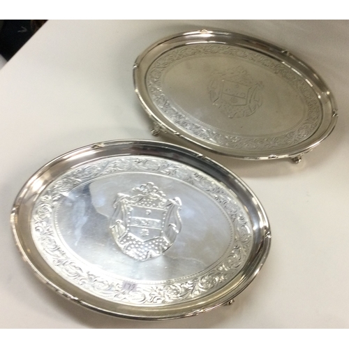 179 - A fine pair of engraved George III oval silver salvers. London 1793. By John Schofield. Approx. 838 ... 