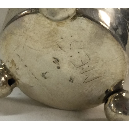 181 - An early 18th Century Norwegian silver beaker on feet. Circa 1750. Marked to base. Approx. 90 grams.... 