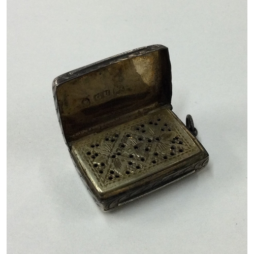 274 - A Victorian silver engraved vinaigrette. Birmingham 1856. By George Unite. Approx. 13 grams. Est. £1... 