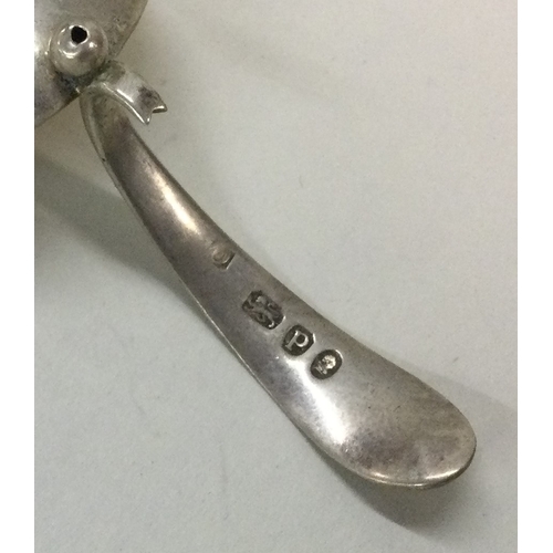 30 - An unusual George III silver caddy spoon. London 1810. Approx. 9 grams. Est. £45 - £50.