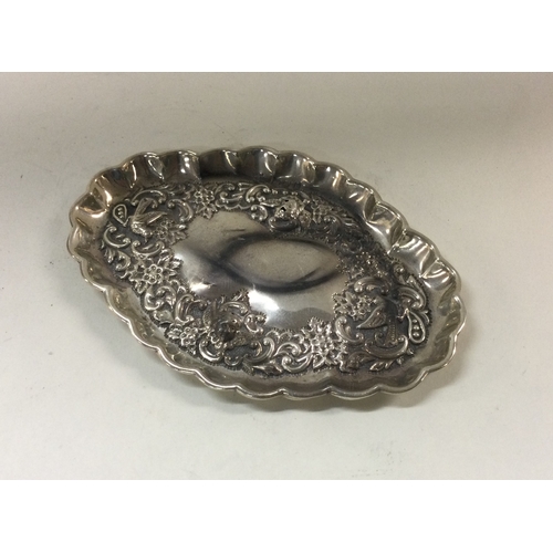 371 - CHESTER: A Victorian silver chased dish. 1898. Approx. 36 grams. Est. £30 - £50.