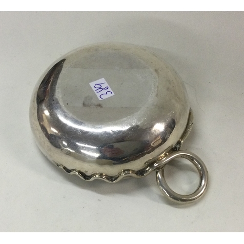 389 - An 18th Century French silver wine tester. Approx. 89 grams. Est. £250 - £350.