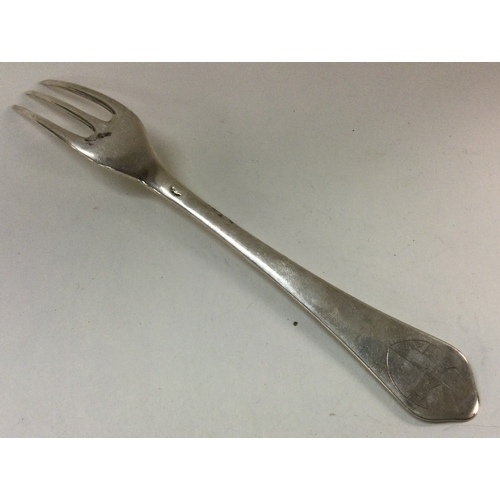 391 - An early 18th Century silver dog nose fork. Approx. 56 grams. Est. £100 - £150.