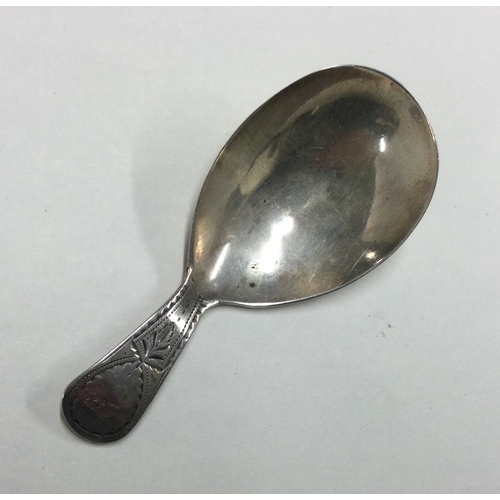 402 - A good Georgian silver caddy spoon. London. Approx. 7 grams. Est. £30 - £40.