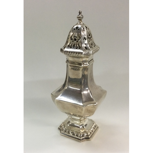 41 - A large silver shaped sugar caster. London. Approx. 148 grams. Est. £100 - £200.