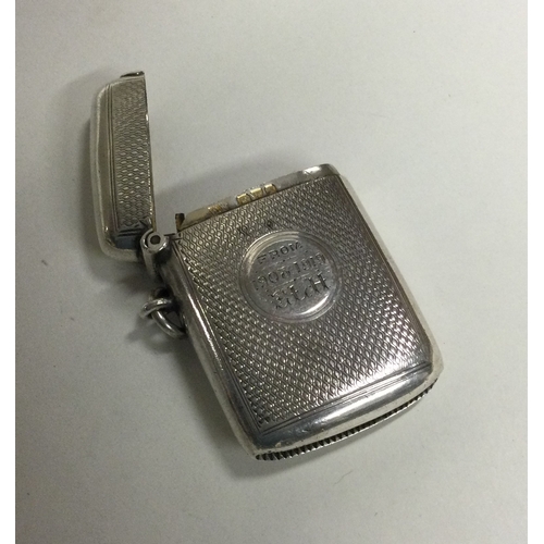 438 - CHESTER: A good engine turned silver vesta case with hinged cover. Approx. 28 grams. Est. £30 - £40.