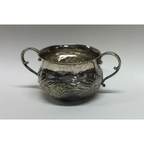 458 - A stylish silver two handled porringer. Sheffield. By H&S. Approx. 129 grams. Est. £60 - £80.