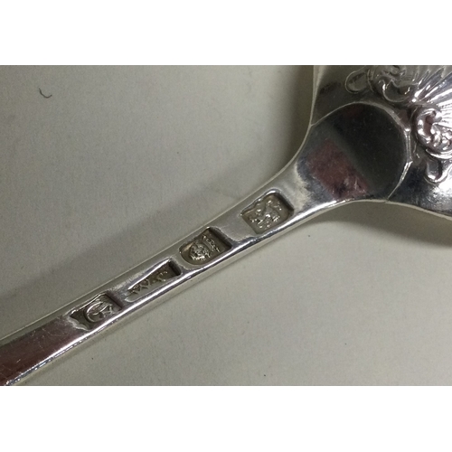 470 - A fine Hanoverian pattern silver spoon with crested terminal. London. By WC. Approx. 64 grams. Est. ... 