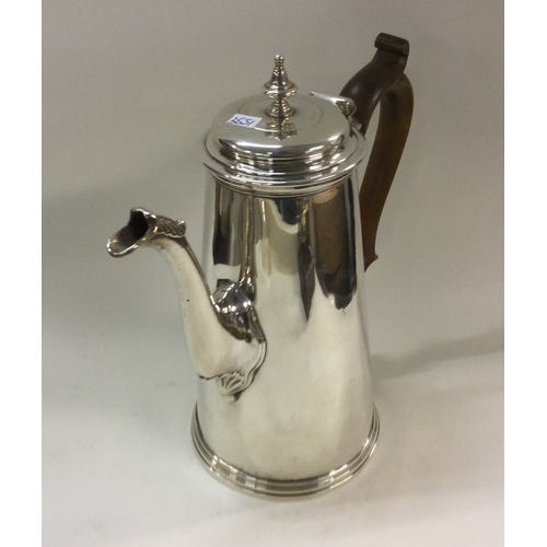 500 - A good George II straight sided tapering coffee pot of plain form. London 1732. By Elizabeth Buteux.... 