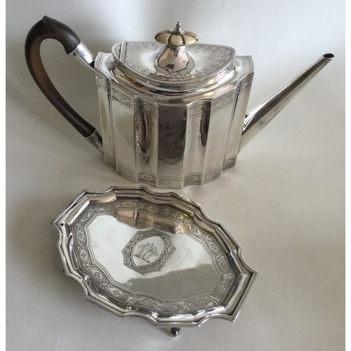 505 - A good Georgian silver teapot of shaped form to crested sides. London 1770. Approx. 572 grams. Est. ... 