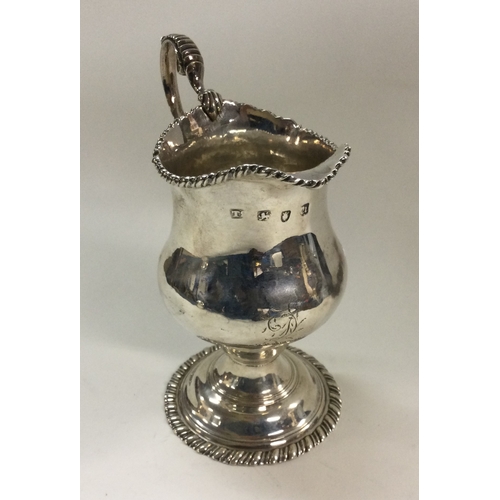 510 - A George III silver cream jug. London 1775. By TS. Approx. 107 grams. Est. £80 - £120.