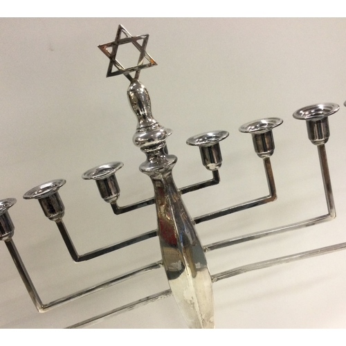 53 - A large Judaica silver Menorah. Birmingham 1933. By BG&Co. Approx. 383 grams. Est. £400 - £500.