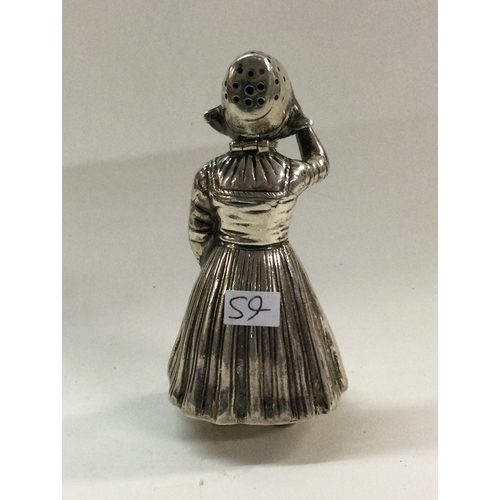 59 - A heavy 19th Century Dutch silver figure of a lady. Approx. 93 grams. Est. £200 - £300.