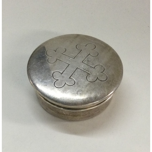 61 - An engraved silver hinged top box. Approx. 24 grams. est. £20 - £30.